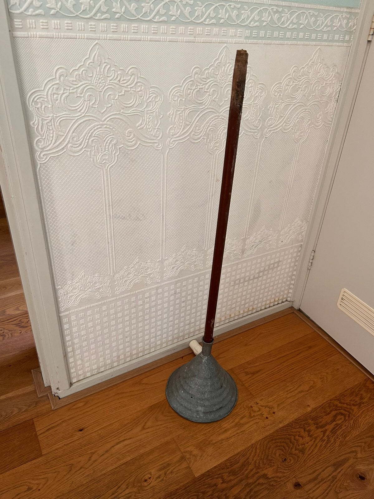 Oude zinken wasstamper, Ophalen