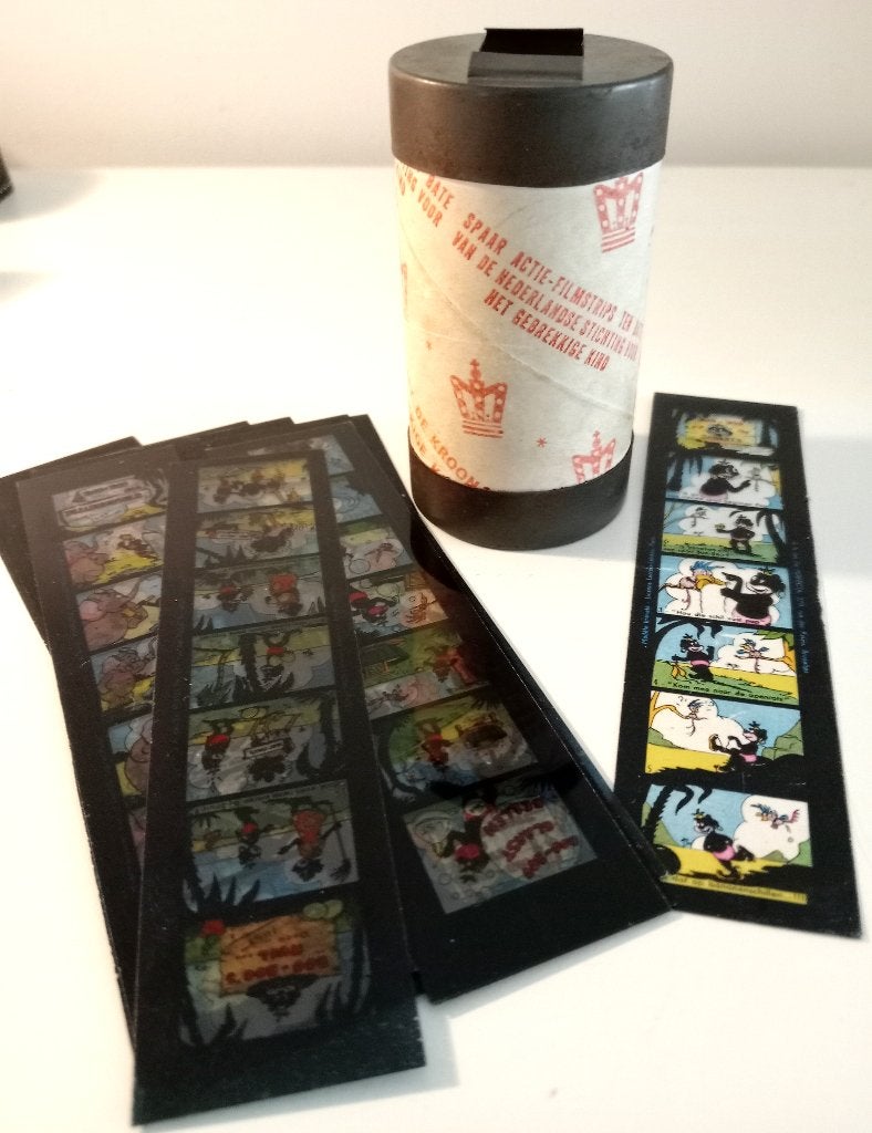 Filmstrips 20 stuks + filmstripkijker  negertje Boo-Boo 1961, Ophalen of Verzenden, Overige figuren, Gebruikt