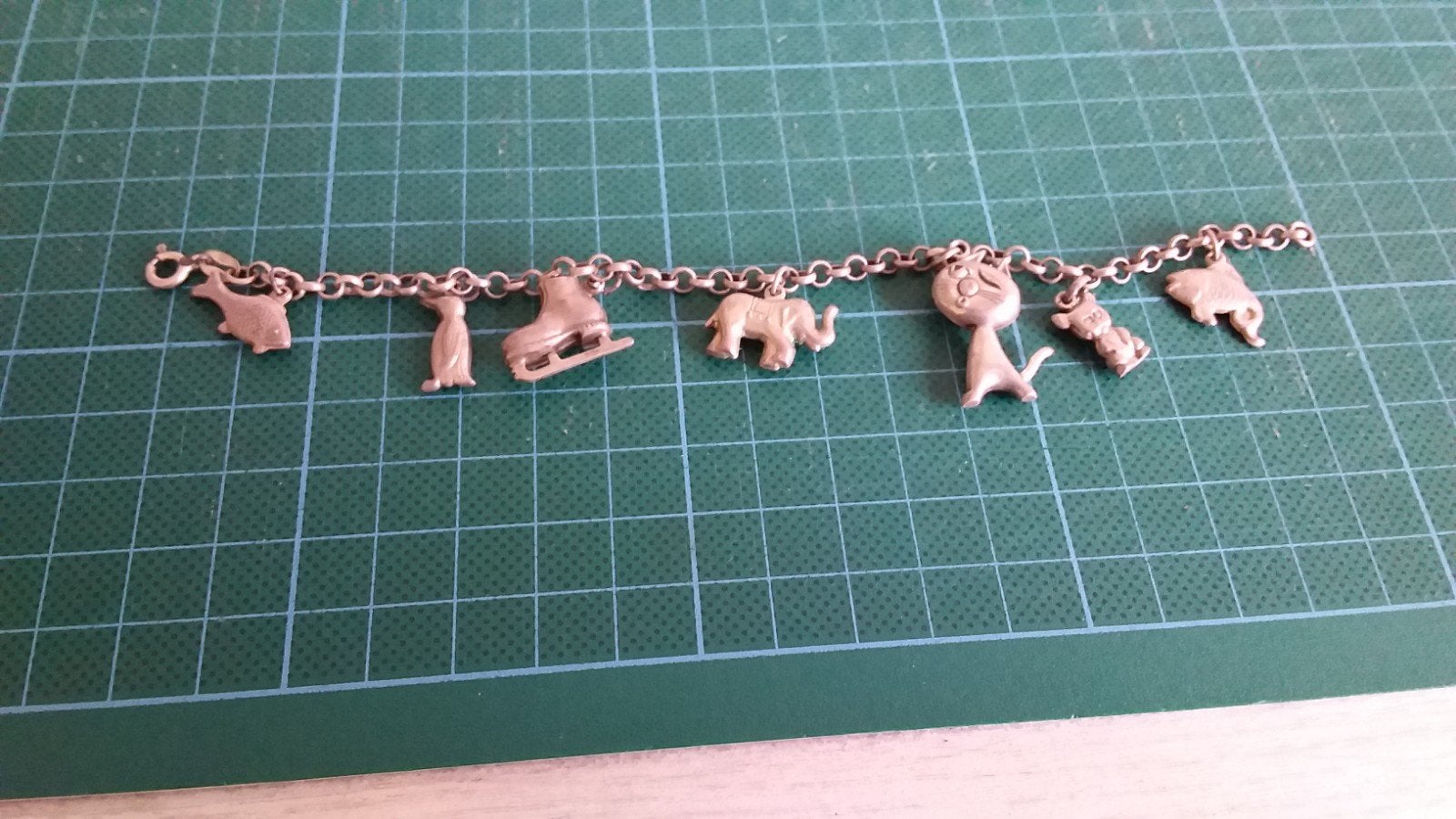 Zilveren kinderarmbandje met 7 unieke bedeltjes, Ophalen of Verzenden