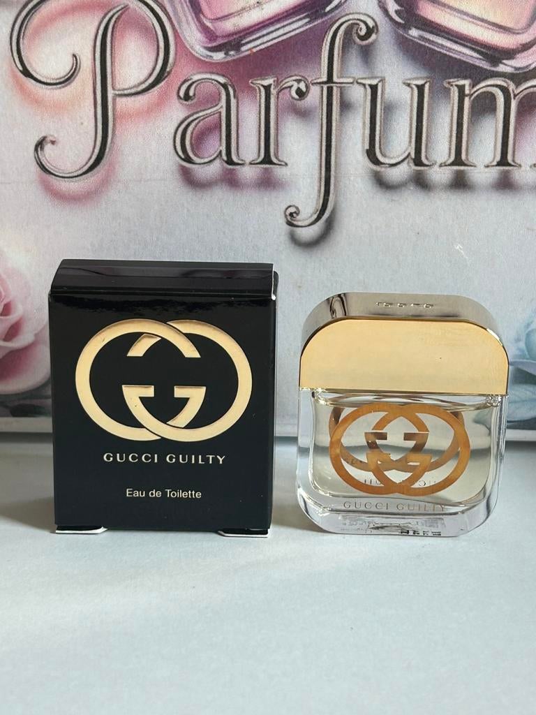 Gucci - guilty pour femme miniature 5ml edt, Ophalen of Verzenden, Nieuw, Miniatuur, Gevuld