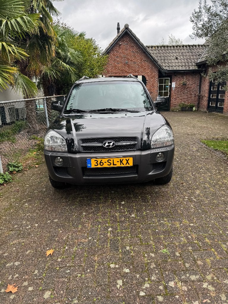 Hyundai Tucson 2.0 I 2WD 2006 Zwart, Stof, Zwart, 4 cilinders, Zwart