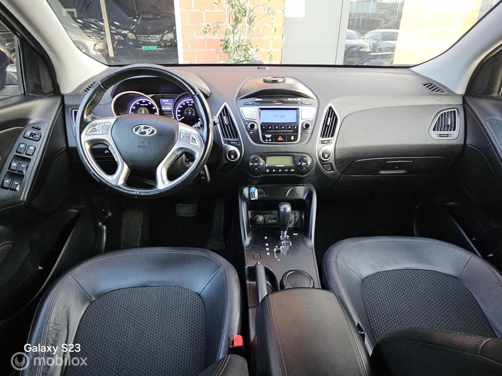 Hyundai ix35 2.0i Style Leer Airco Cruise controle Automaat, Auto's, Gebruikt, 4 cilinders, Parkeersensor, 1600 kg