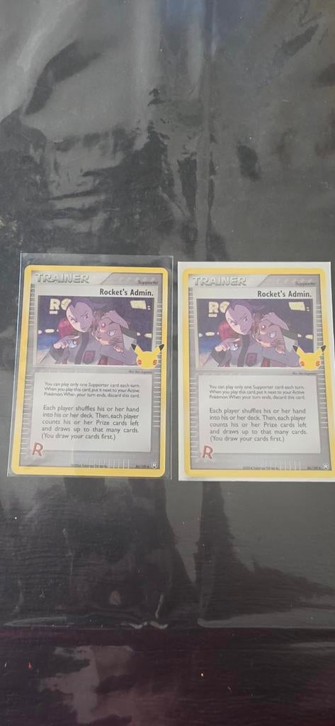 Pokémon TCG Rocket's Admin. Celebrations Kaart (2x), Ophalen of Verzenden, Zo goed als nieuw, Meerdere kaarten