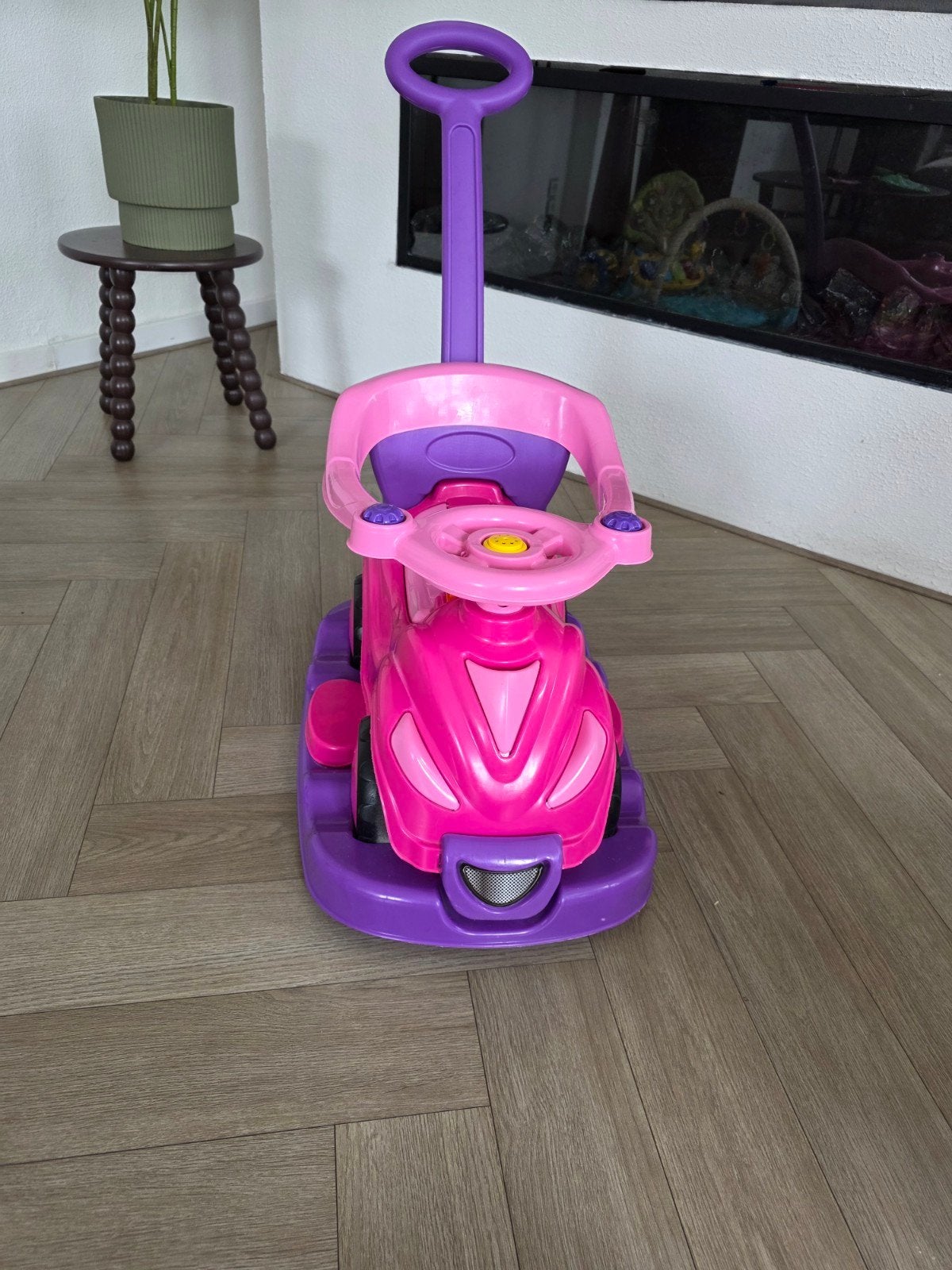Loopauto / duwauto roze-paars met duwstang, Kinderen en Baby's, Ophalen of Verzenden, Gebruikt