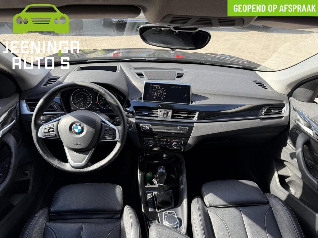 BMW X1 sDrive18i Centennial High Executive|Stoelverwarming|N, 136 pk, Gebruikt, Zwart, Leder