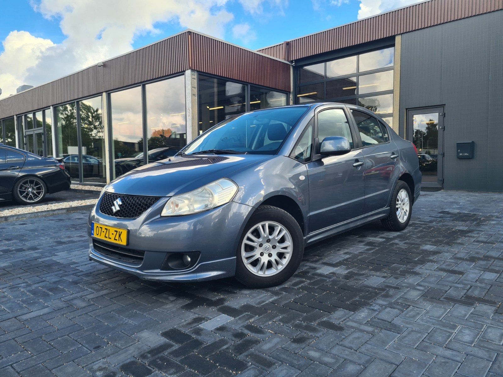 Suzuki SX4 1.6 2008 Grijs Airco Nieuwe Apk LM Nette Auto, Auto's, Zwart, 4 cilinders, 49 €/maand, Origineel Nederlands