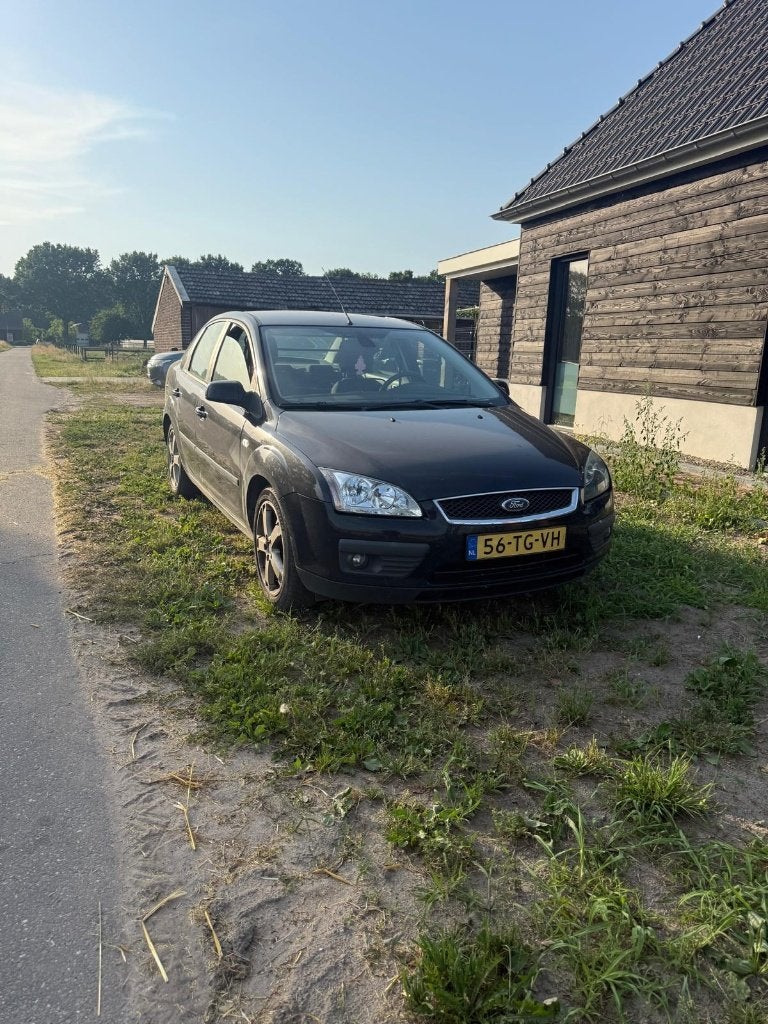 Ford Focus 1.6 74KW 4D 2006 Zwart, Auto's, Ford, 1596 cc, 15 km/l, 4 cilinders, 635 kg