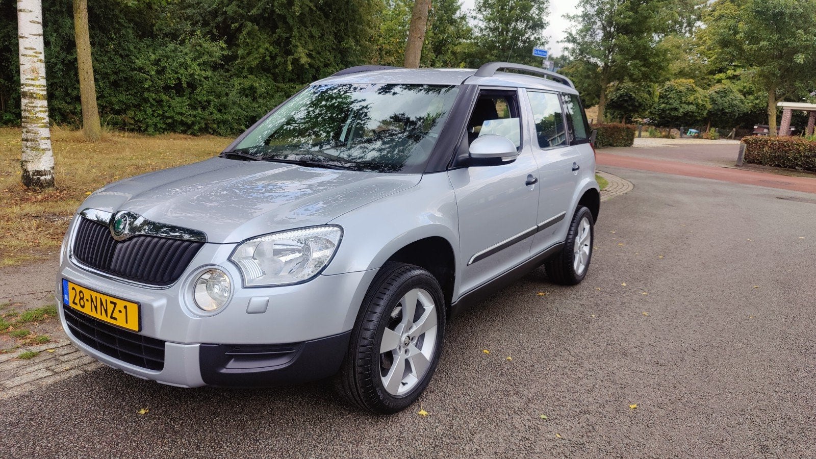 Skoda Yeti 1.2 TSI 77KW van 1e Eigenaar met 78.000 km NAP, Auto's, Voorwielaandrijving, Euro 5, Stof, Zwart