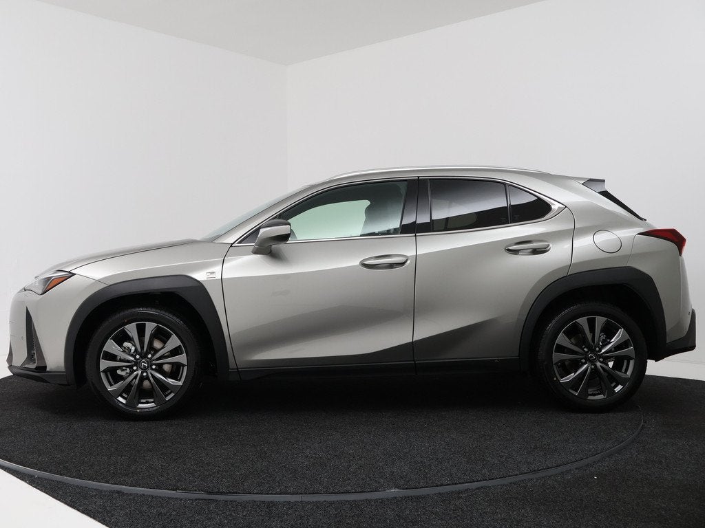 Lexus UX 300h 35th Edition (bj 2026, automaat), Auto's, Lexus, 12 maanden, Zwart, 4 cilinders, Leder
