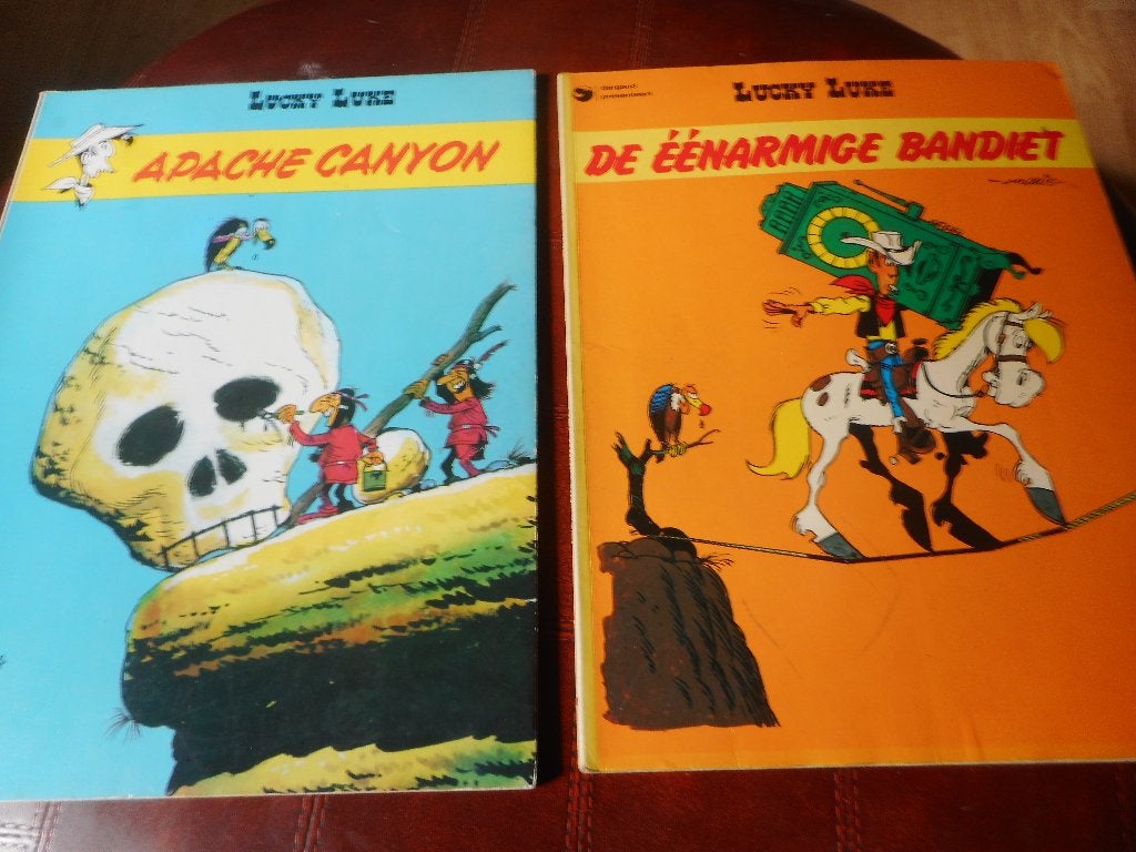 Twee Lucky Luke....strips, Gelezen, Ophalen of Verzenden, Morris & Goscinny, Meerdere stripboeken