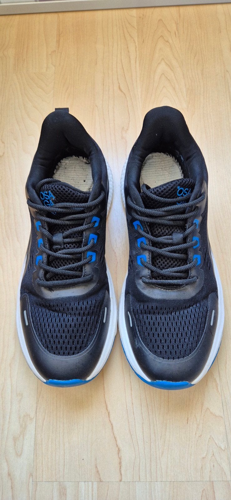 Zwarte Osaga hardloopschoenen met blauwe accenten Maat 41, Sport en Fitness, Overige merken, Hardloopschoenen, Ophalen of Verzenden