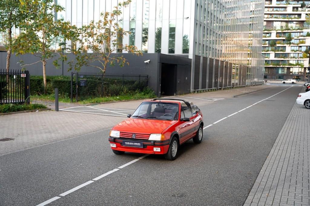 Peugeot 205 1.9 CTI Rood - Nieuwe APK en groot onderhoud, Voorwielaandrijving, Stof, Zwart, Cabriolet