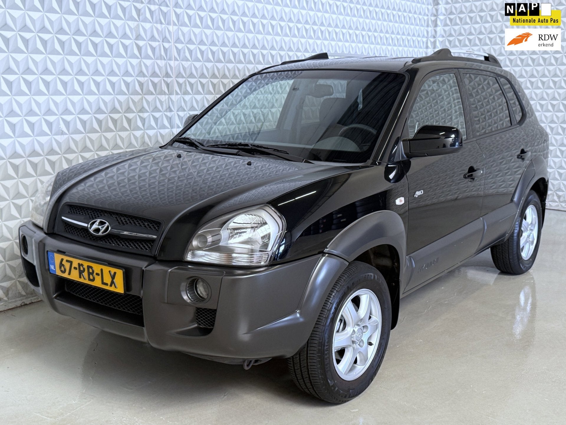 Hyundai Tucson 2.7i V6 4WD Style AUTOMAAT *UNIEK!* 97.000km, Auto's, Automaat, Gebruikt, 2656 cc, Zwart