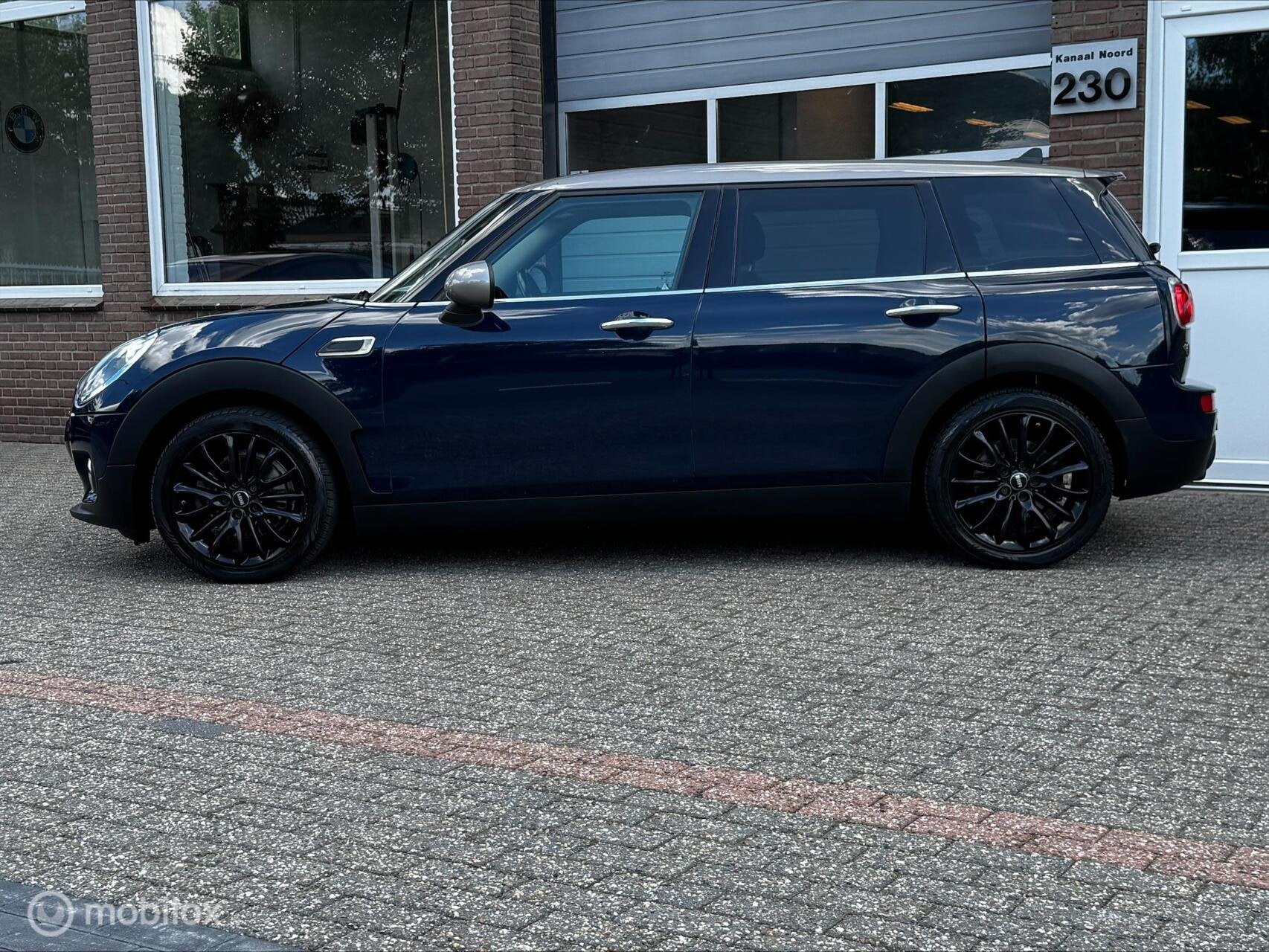 Mini Clubman 1.5 Cooper AUT ECC-AIRCO/NAVI/CRUISE/TREKHAAK, Auto's, Mini, 136 pk, Gebruikt, Blauw, Origineel Nederlands