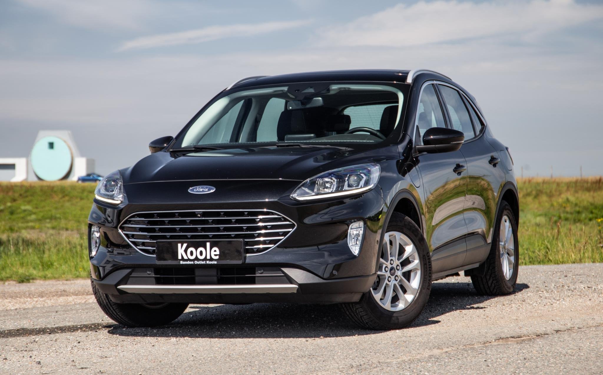 Ford Kuga 2.5 PHEV Titanium PANORAMA DAK / CAMERA / ADAPTIVE, Auto's, Gebruikt, Euro 6, 4 cilinders, Zwart
