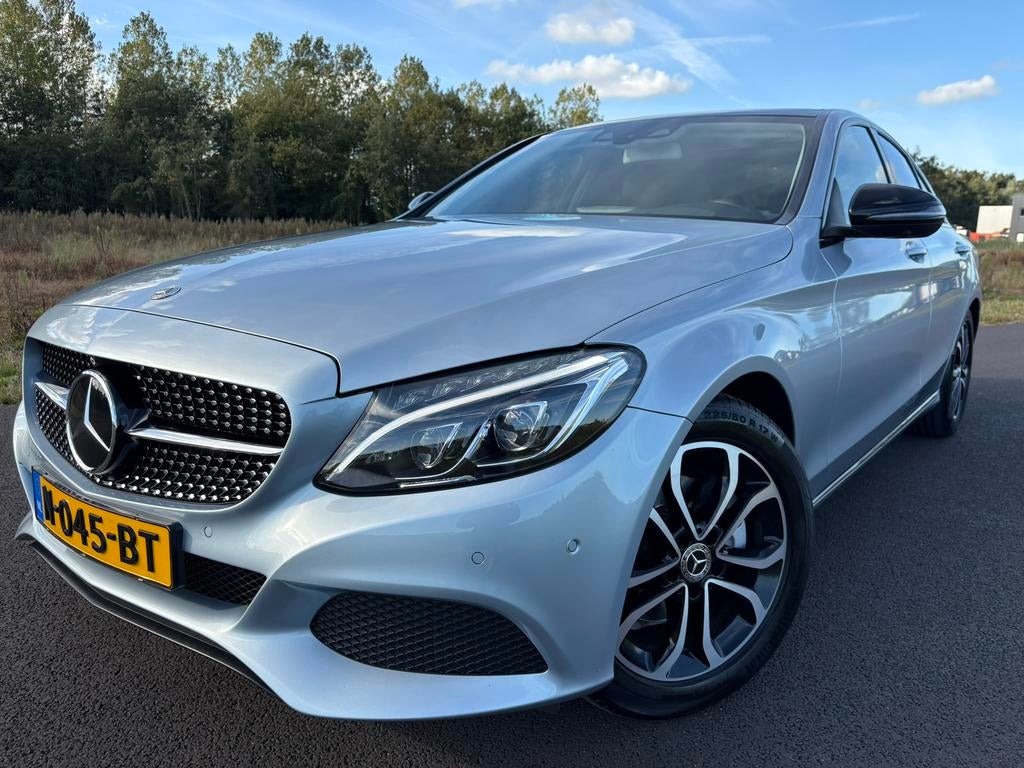 Mercedes-Benz C-Klasse C200 2.0 135KW Aut7 2016 Grijs, Auto's, Lichtsensor, 1800 kg, Zwart, 4 cilinders