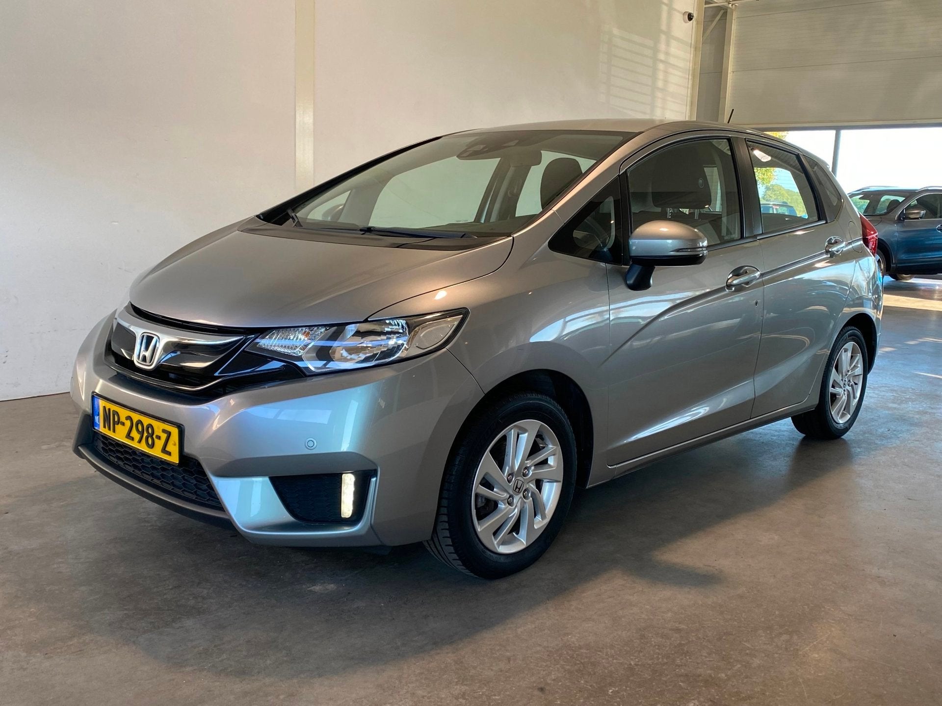 Honda Jazz 1.3 i-VTEC Trekhaak Cruise Navi NL-auto, Auto's, Voorwielaandrijving, 450 kg, Gebruikt, Euro 6