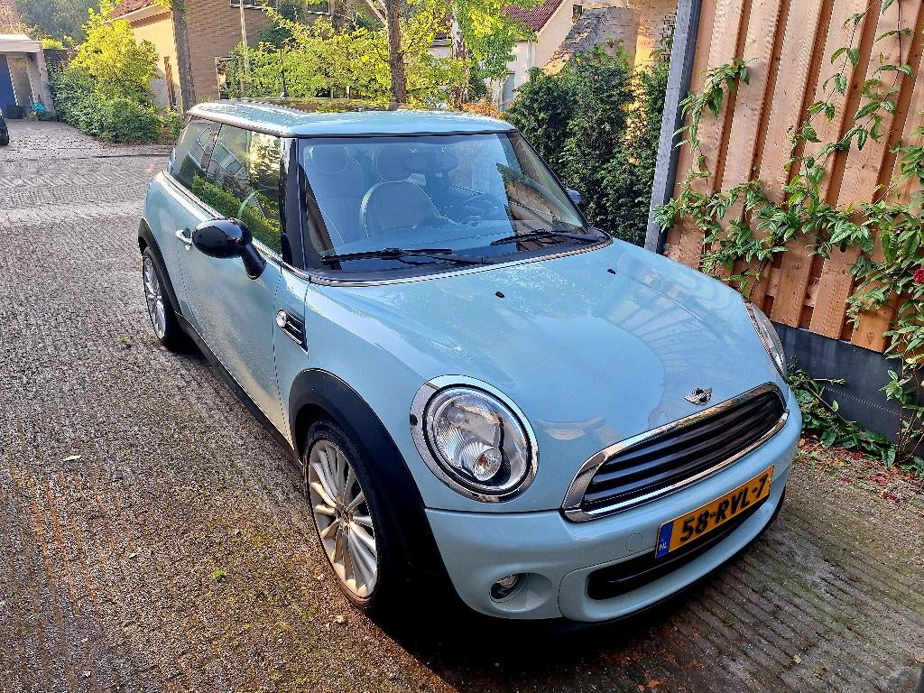 Mini (r56) 1.6 75pk 2011 Minimalist , Blauw, Voorwielaandrijving, Euro 5, 40 €/maand, Bruin