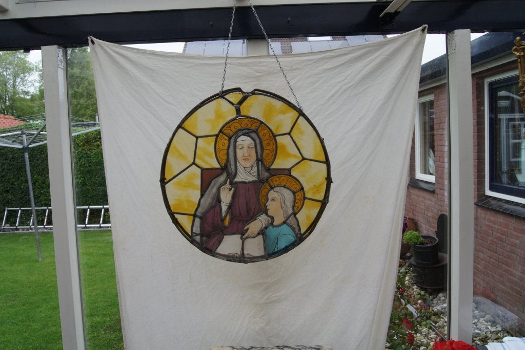 Glas en Lood raam  een religieuze voorstelling, Ophalen