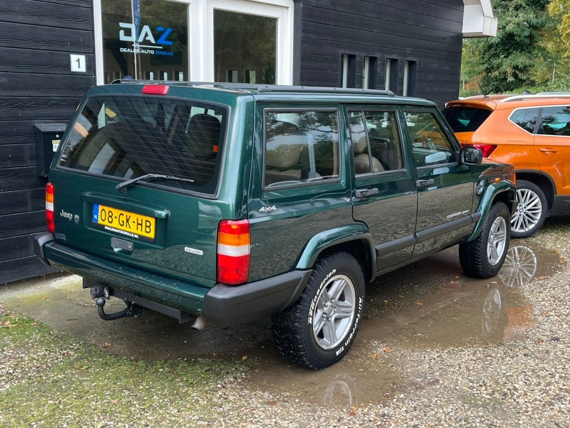 Jeep Cherokee 4.0i 60th Anniversary Aut/Airco/Leer/Cruise/Yo, Beige, Vierwielaandrijving, Stoelverwarming, 184 pk