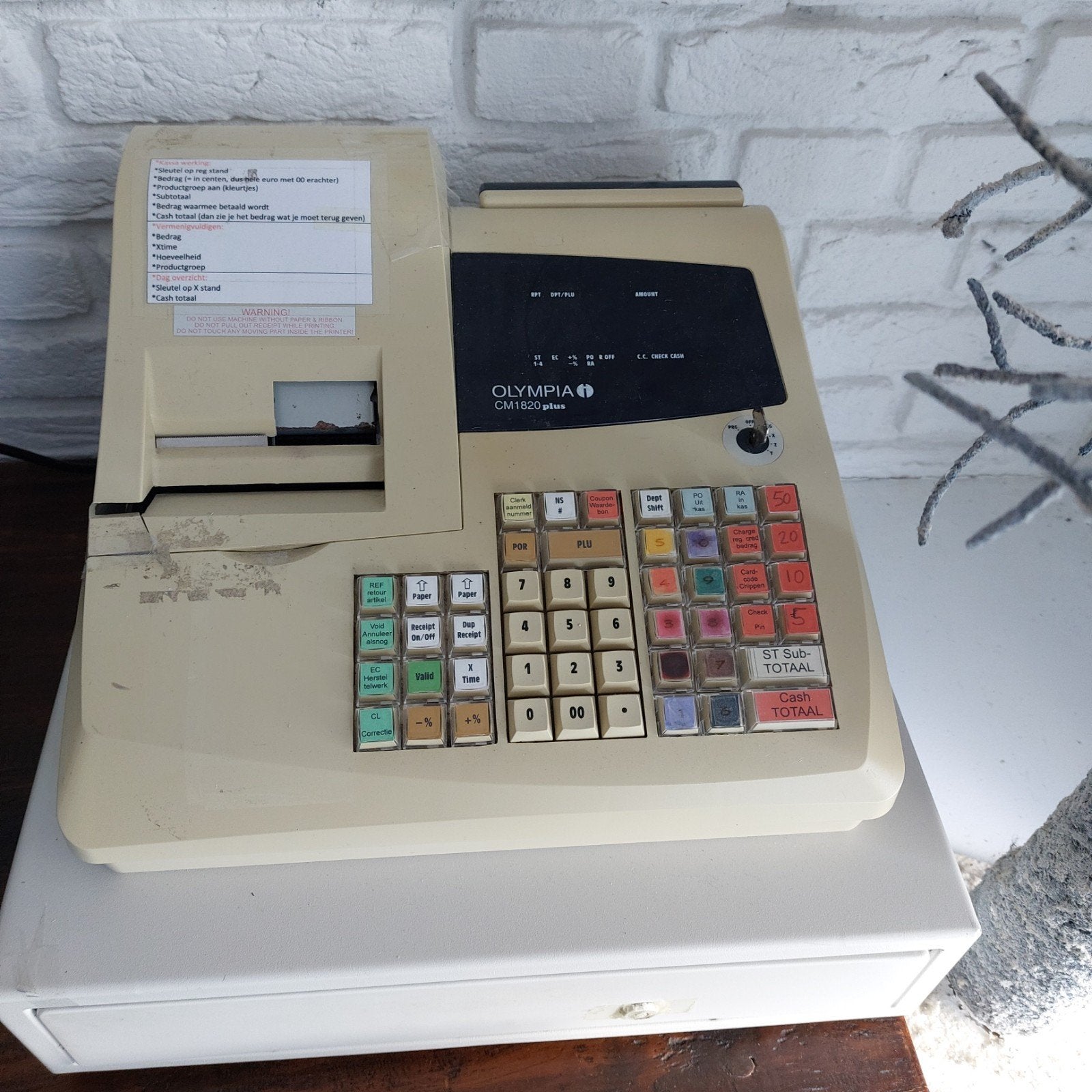 Vintage Olympia Kassaregister, Ophalen