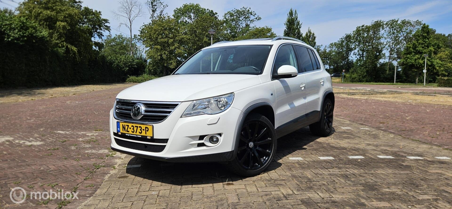 Volkswagen Tiguan 1.4 TSI Comfort&Design, 4Motion, Panorama, Auto's, Volkswagen, 13 km/l, Gebruikt, 4 cilinders, Wit