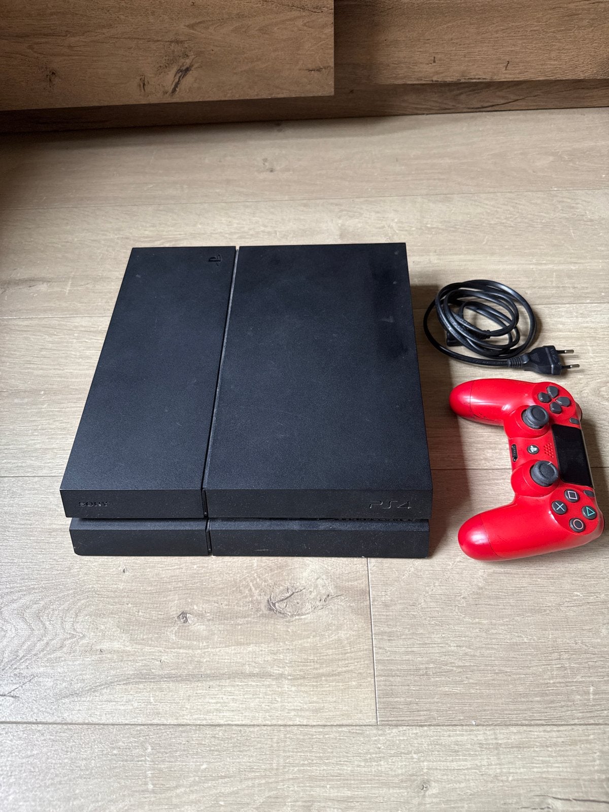 Sony PlayStation 4 (PS4) met 1 rode controller