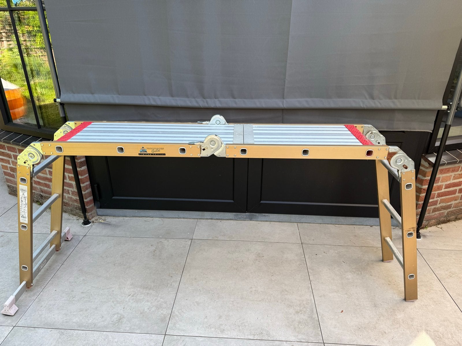 Altrex Varitracks Gold 4x3 vouwladder met plateaus, Ophalen, Gebruikt, Ladder, Opvouwbaar of Inschuifbaar