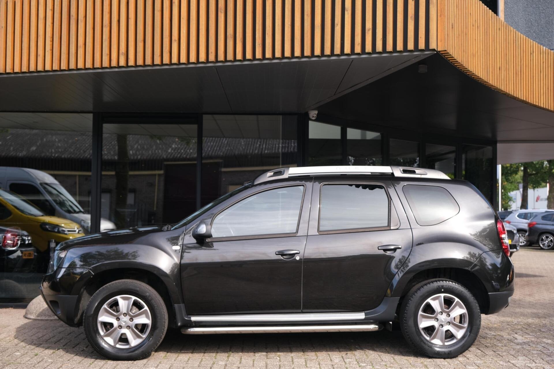 Dacia Duster 1.2 TCe 4x2 Prestige|Rijklaar!|Trekhaak|PDC|Lee, Auto's, Voorwielaandrijving, Dealer onderhouden, 125 pk, Gebruikt