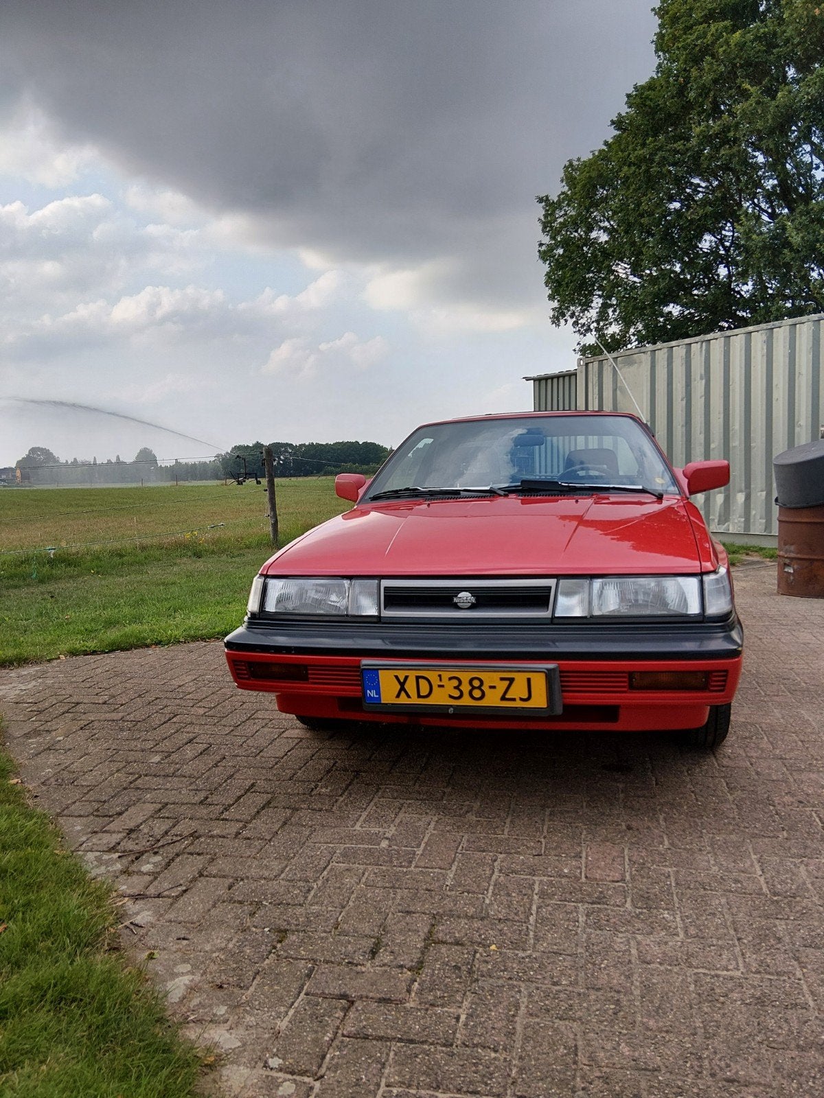 Nissan Sunny 1.6 I Coupe K6 1989 Rood, foto 4