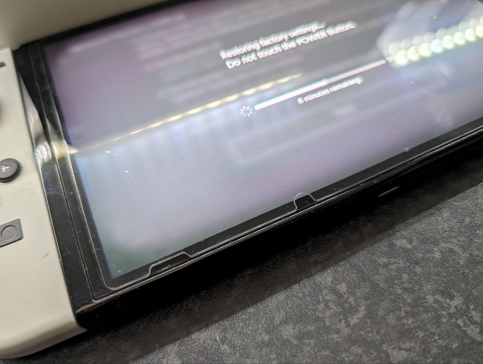 Foto 5 van Nintendo Switch OLED + 5 Fysieke Games (Mario Kart 8, Switch