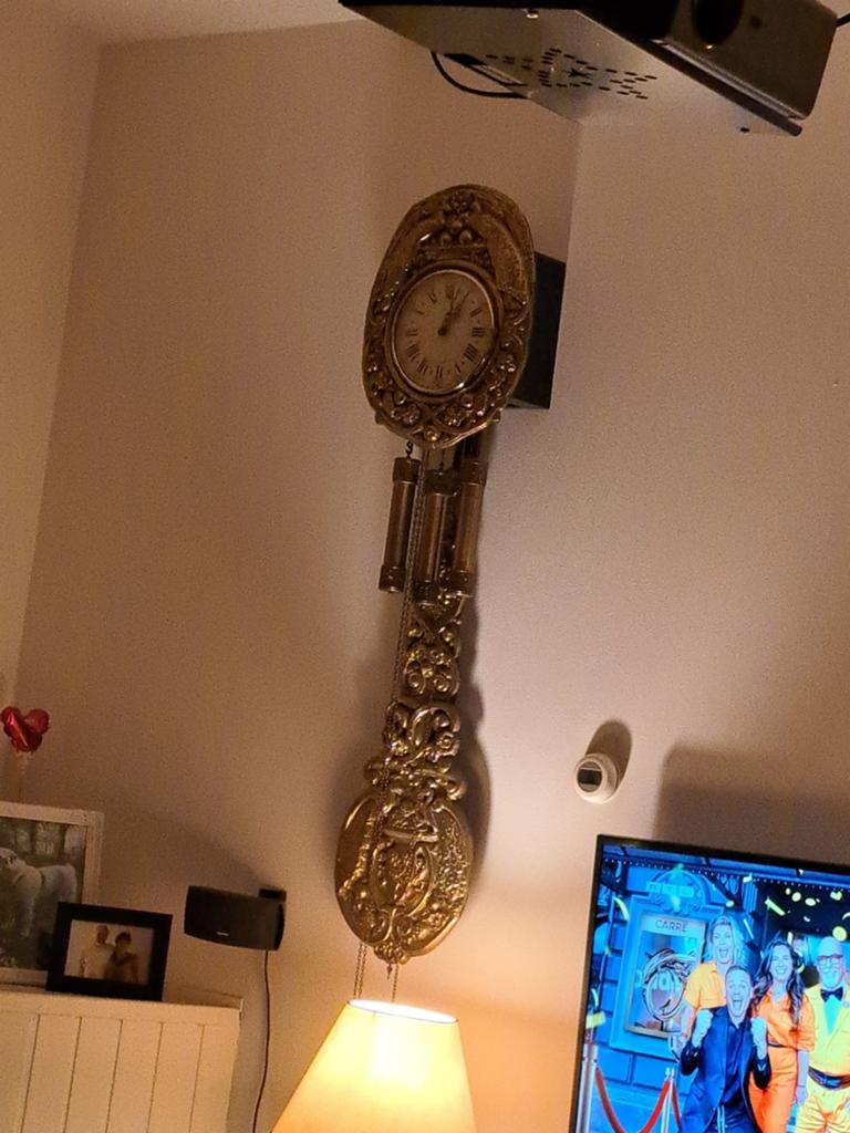 Antieke gouden hangklok met slinger, Ophalen of Verzenden