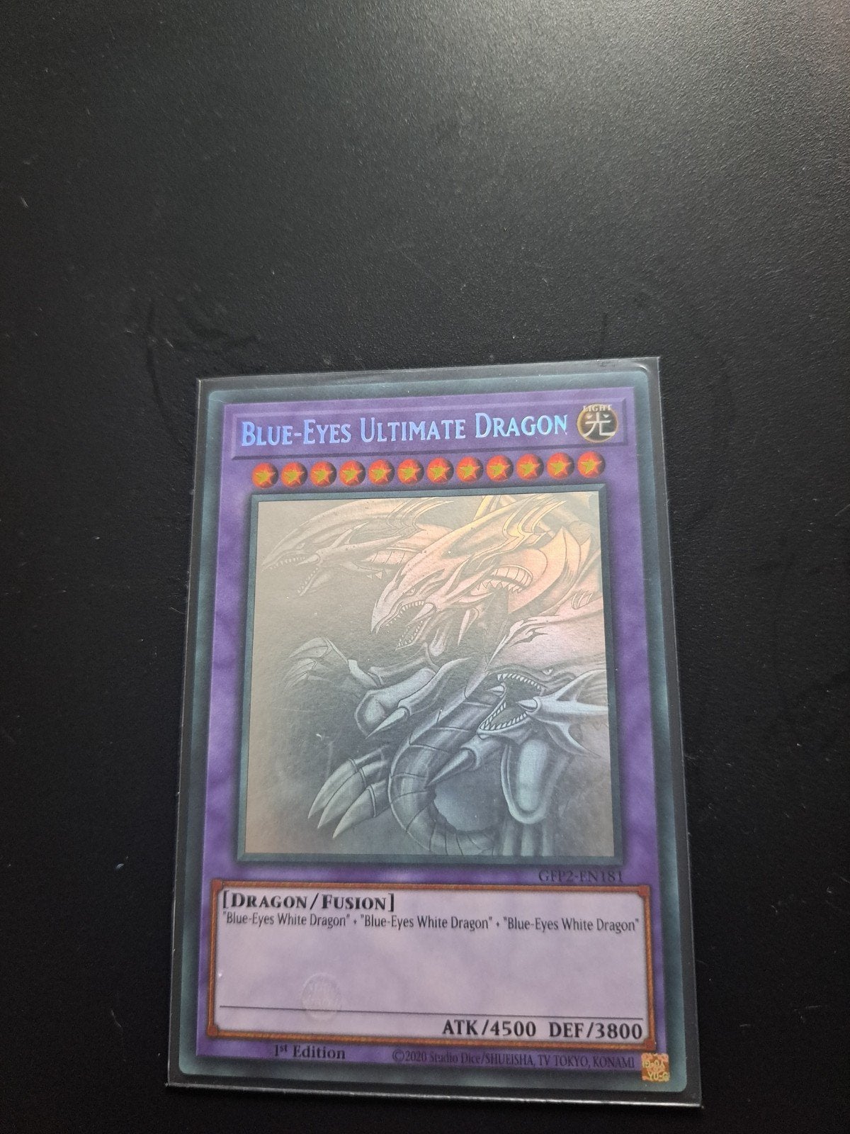 Blue-Eyes Ultimate Dragon – Ghost Rare – GFP2-EN181, Ophalen, Zo goed als nieuw