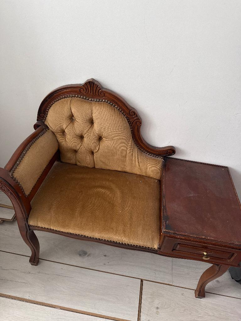 Queen Anne telefoon bankje, Ophalen