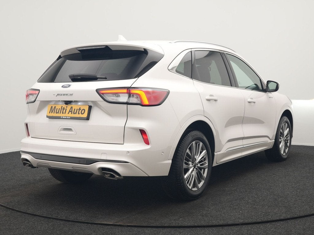 Ford Kuga 2.5 Vignale PHEV 225pk Dealer O.H. | Adaptive Crui, Gebruikt, Zwart, 4 cilinders, Adaptive Cruise Control