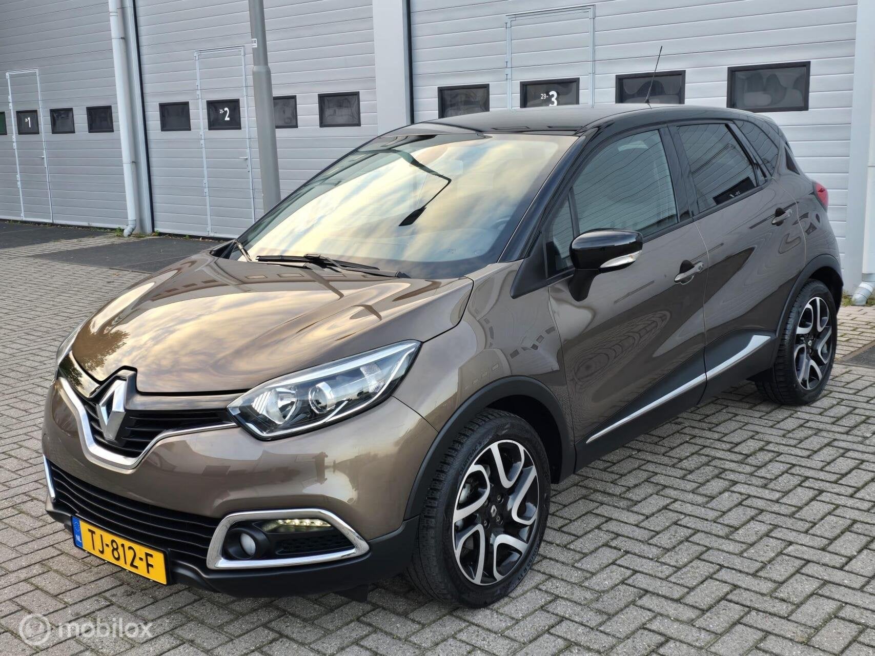 Renault Captur 1.2 TCe Helly Hansen | Automaat | Trekhaak, Auto's, Euro 5, 4 cilinders, Bruin, Verwarmde buitenspiegels