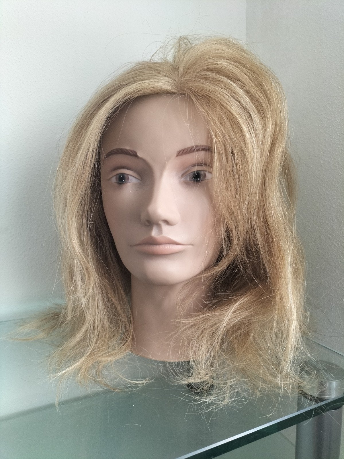 Kappers hoofd - oefenhoofd echt haar, Ophalen