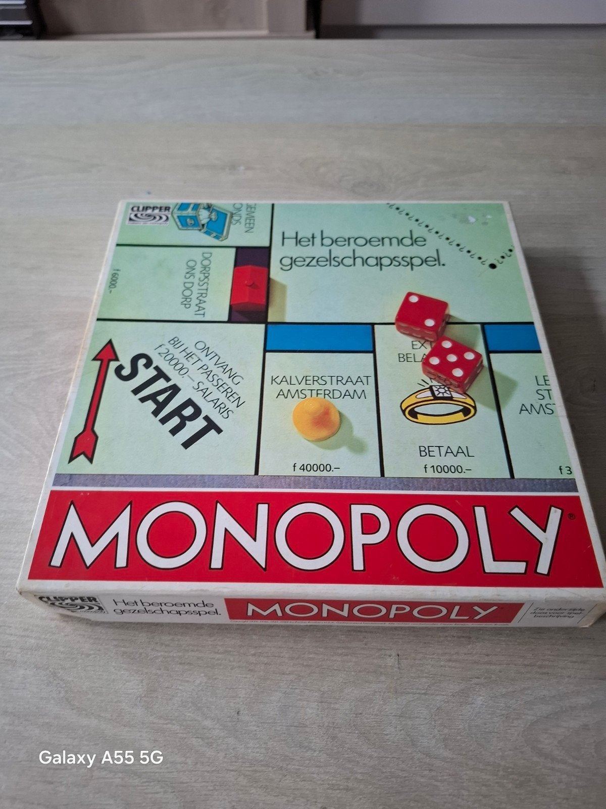 Monopoly - Het beroemde gezelschapsspel (Clipper), Hobby en Vrije tijd, Gezelschapsspellen | Bordspellen, Ophalen of Verzenden