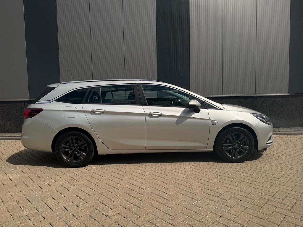 Opel Astra Sports Tourer 1.0 Turbo 120 Jaar Edition, 21 km/l, Gebruikt, Euro 6, 620 kg
