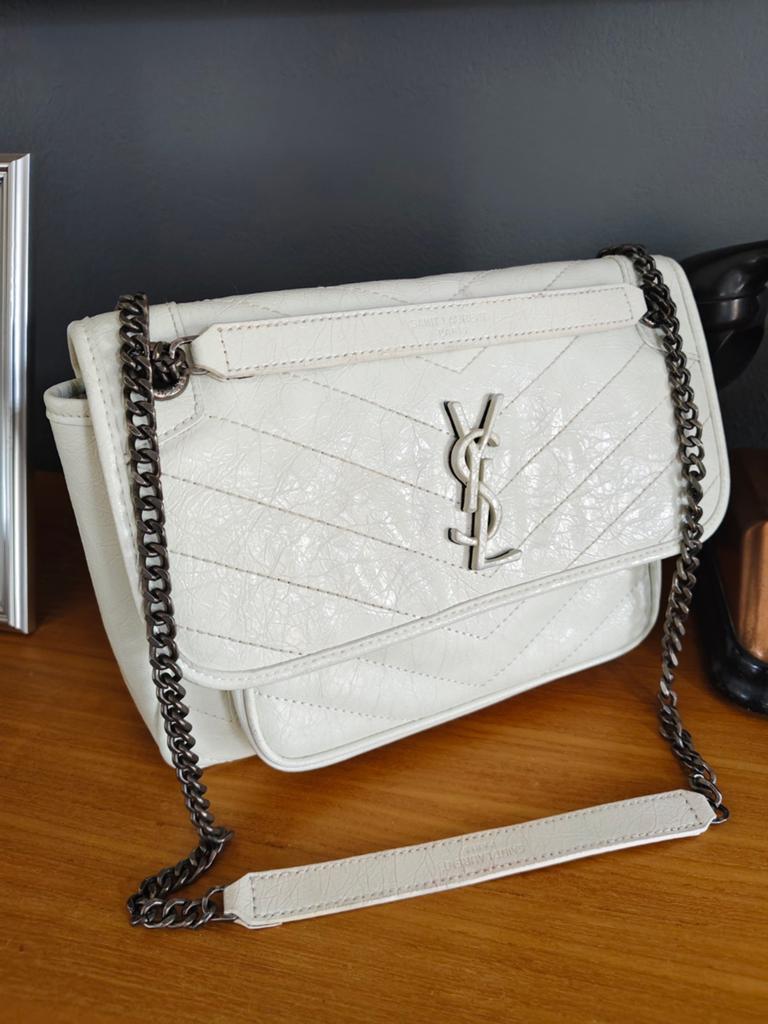 Vintage Saint Laurent Niki, Ophalen of Verzenden, Zo goed als nieuw, Zwart