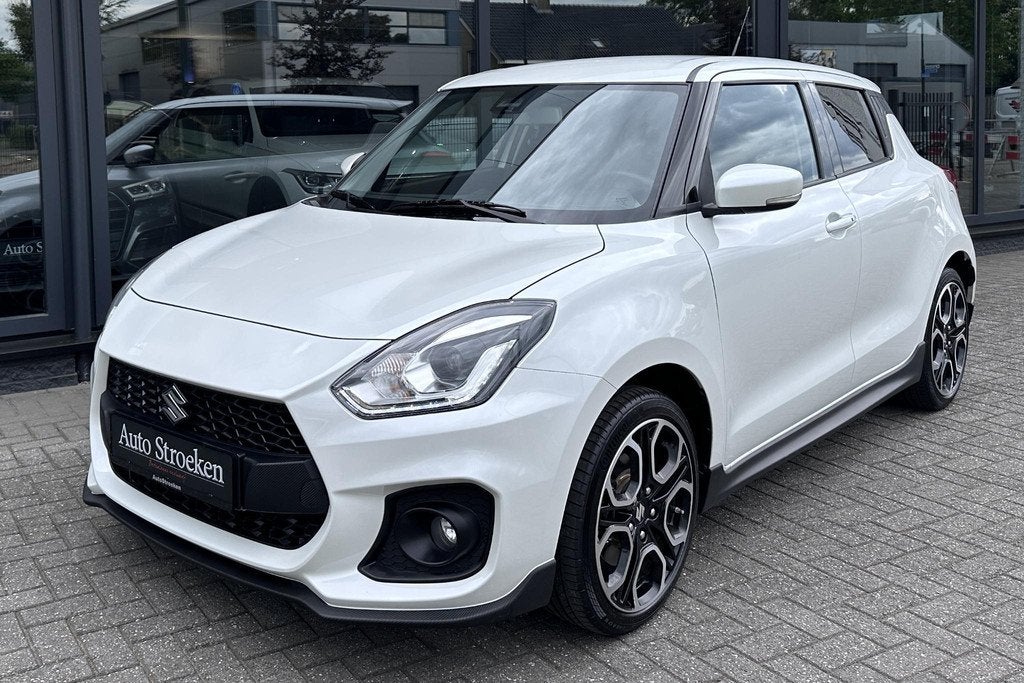 Suzuki Swift 1.4 Sport Smart Hybrid Camera Navigatie Carbon, Voorwielaandrijving, Stof, Gebruikt, Euro 6