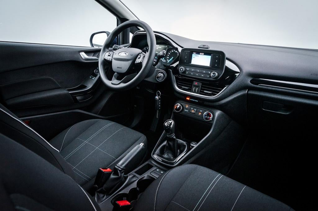 Ford Fiesta 1.1 86 PK Trend | 5 DRS | Airco | Bluetooth | |, Met garantie (alle), Blauw, Lichtsensor, 23 km/l