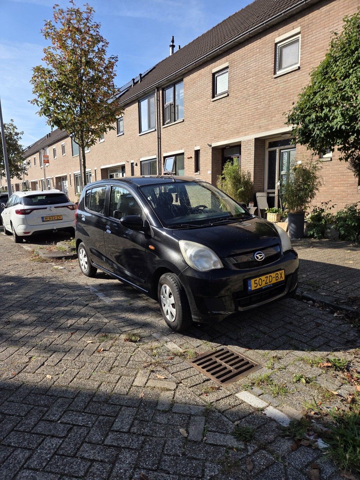Daihatsu Cuore 1.0 5D 2007 Zwart, Auto's, Voorwielaandrijving, 600 kg, 18 €/maand, 4 stoelen