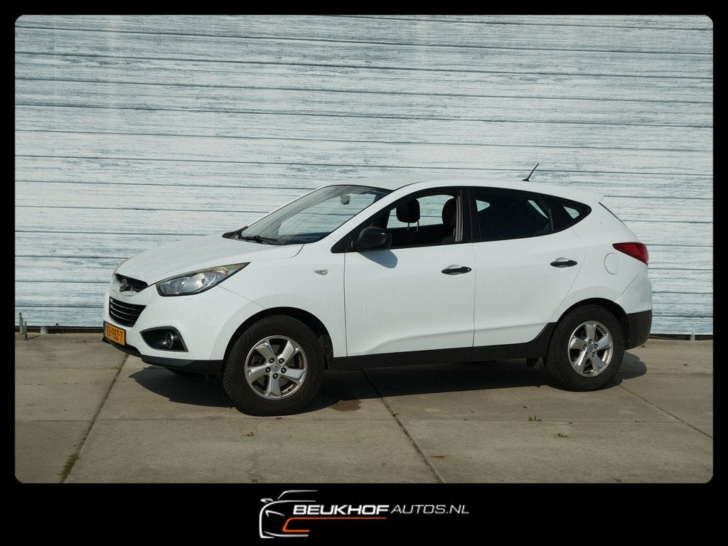 Hyundai Ix35 2.0i Active Trekhaak Airco Velgen Radio, Auto's, Gebruikt, Zwart, 4 cilinders, Origineel Nederlands