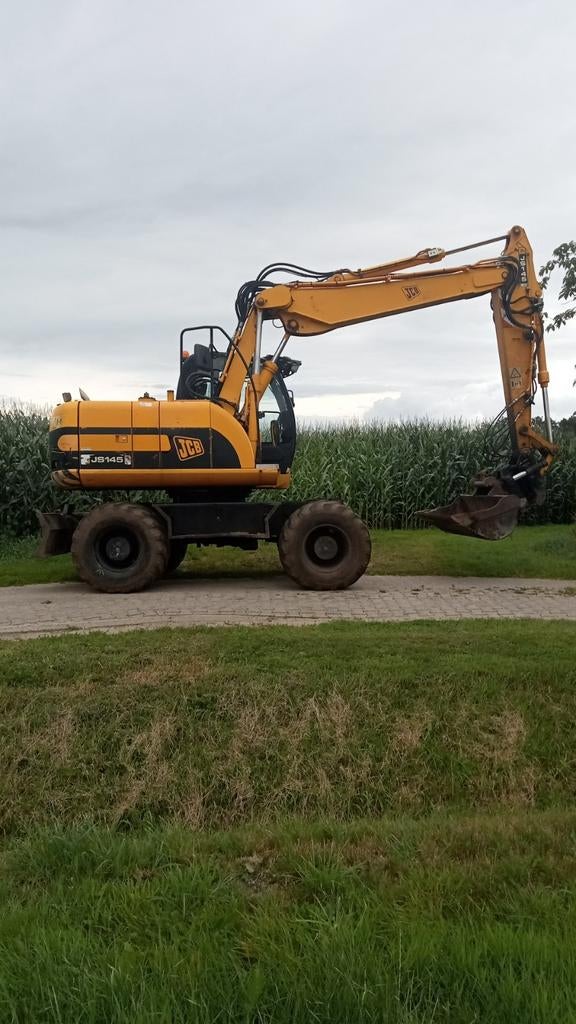 Te koop.JCB mob kraan 145 sw met draaik stuk en bak, Ophalen of Verzenden, Graafmachine