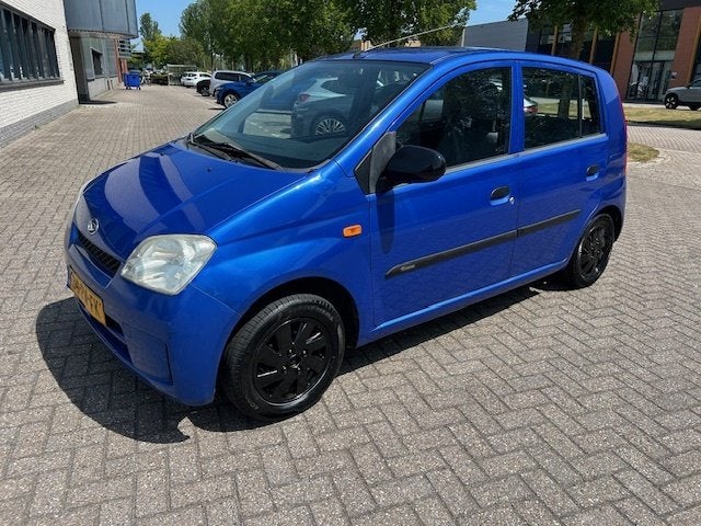 Daihatsu Cuore 1.0-12V Tokyo AUTOMAAT NAP (bj 2004), Auto's, Daihatsu, Bedrijf, Te koop, Cuore, Airbags, Alarm, Startonderbreker
