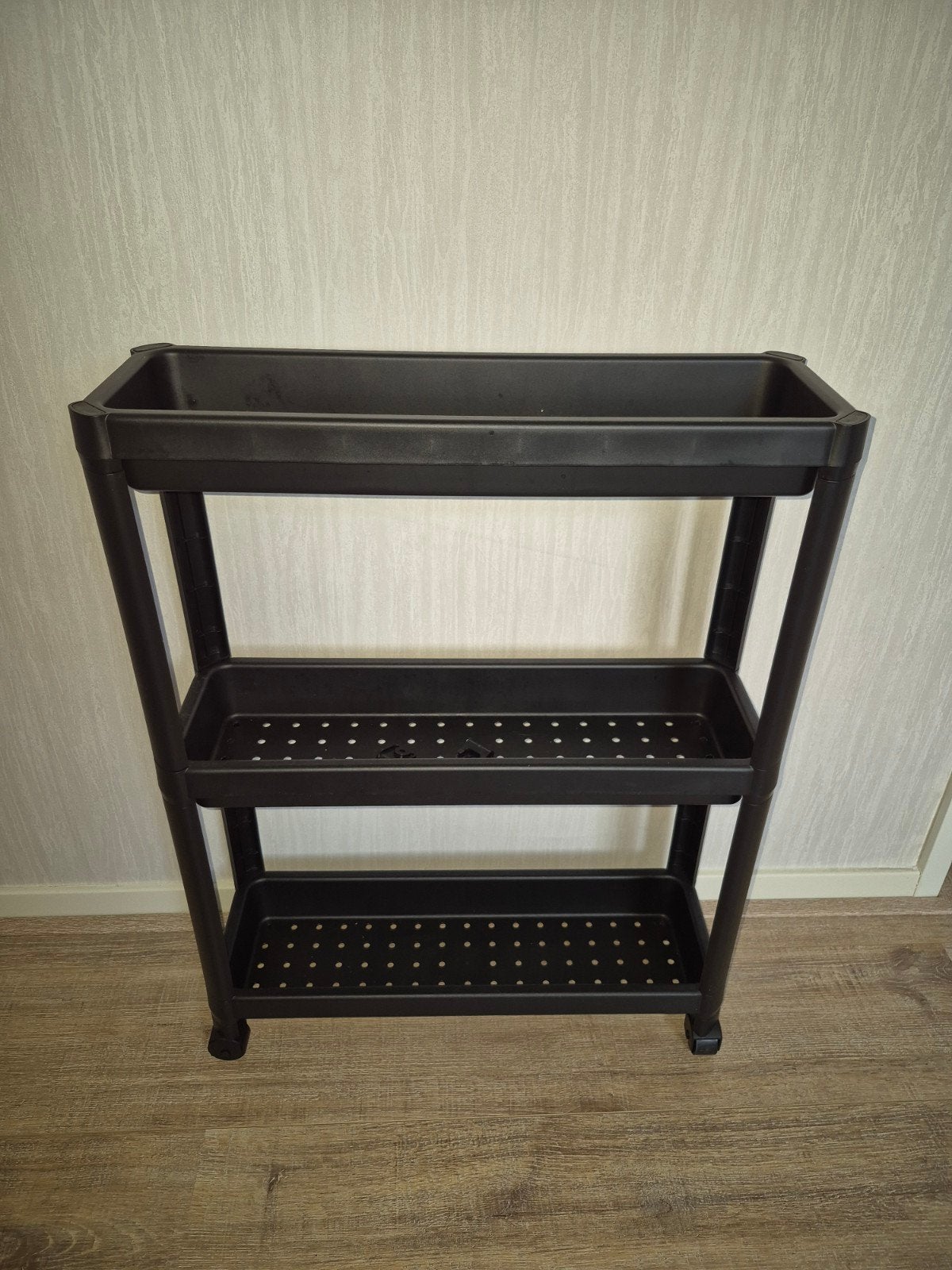 Nieuw zwart opbergrek van Ikea, Ophalen