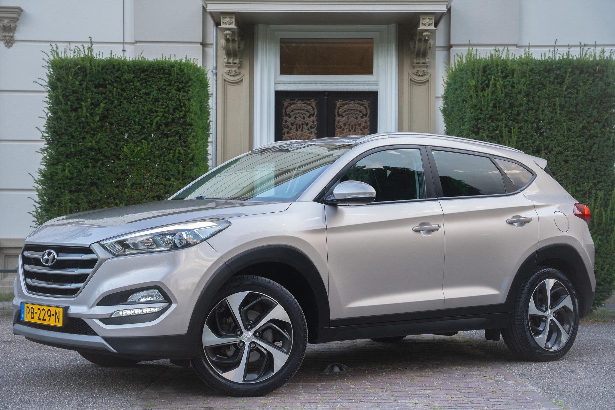 Hyundai Tucson 1.6 GDi Anniversary Edition TREKHAAK | CAMERA, Auto's, Voorwielaandrijving, Stof, Gebruikt, 4 cilinders