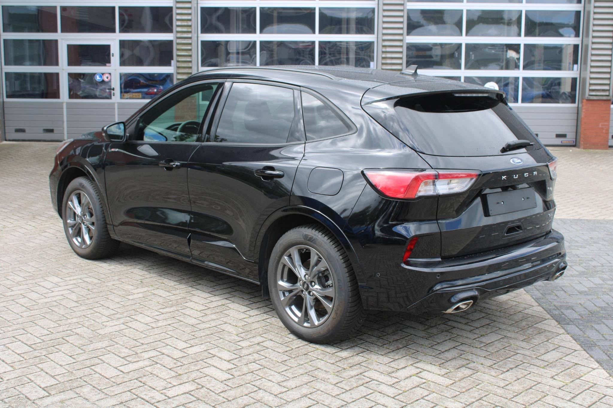 Ford Kuga 2.5 PHEV ST Line X 225 PK | 27.000 KM | Wegklapbar, Auto's, Ford, Gebruikt, 4 cilinders, Zwart, Plug-in hybride