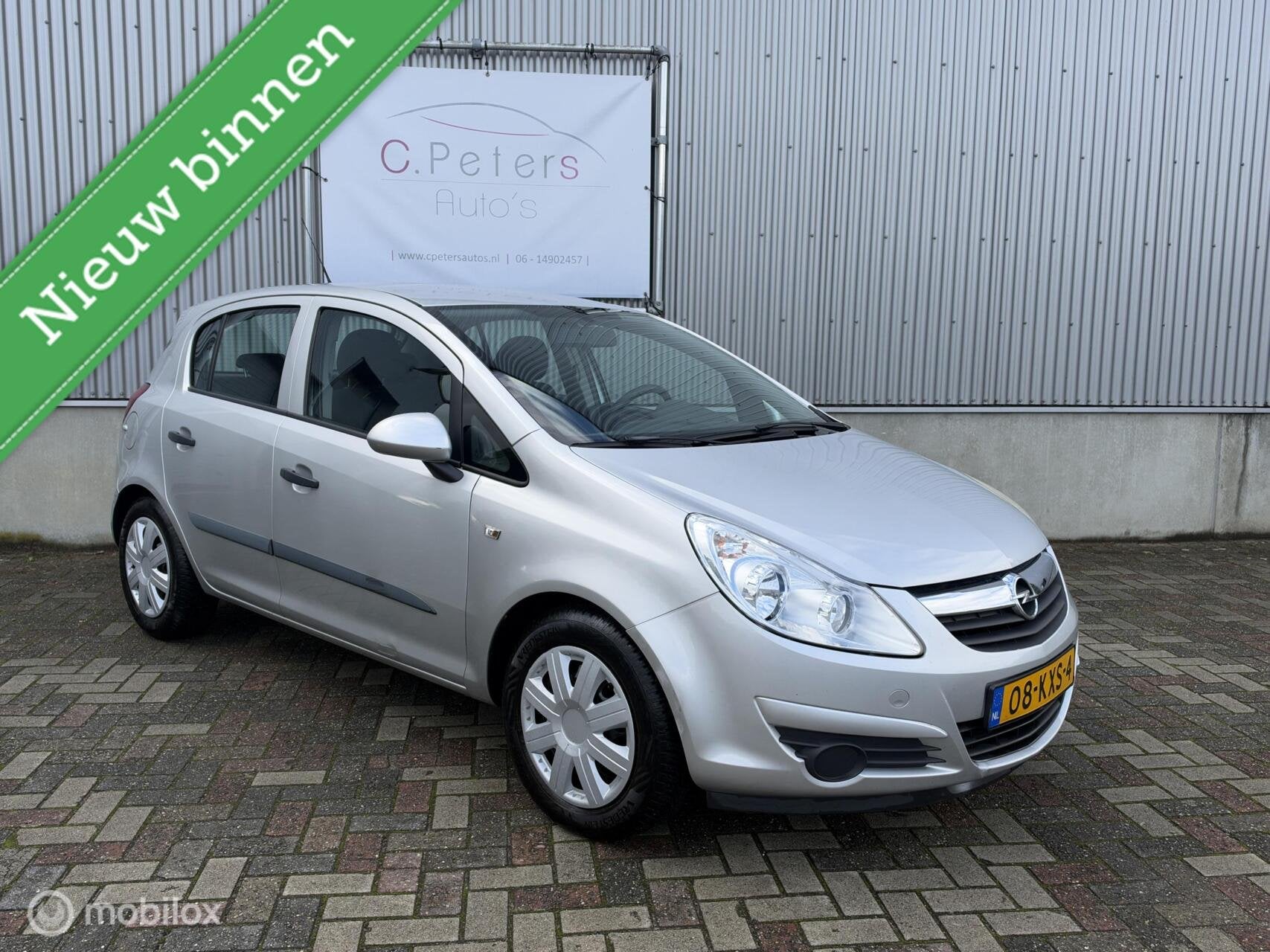 Opel Corsa 1.2-16V Selection 2010 / 5deurs / 4Seizoensbanden, Auto's, Voorwielaandrijving, Euro 5, Gebruikt, 4 cilinders